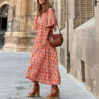 Vestido longo solto e com mangas bufantes