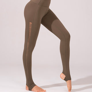 Calça legging com pézinho e recortes na lateral