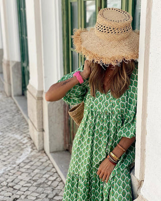 Vestido longo solto e com mangas bufantes